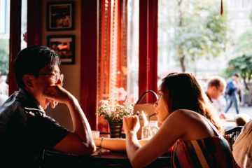a couple on a date in a restaurant