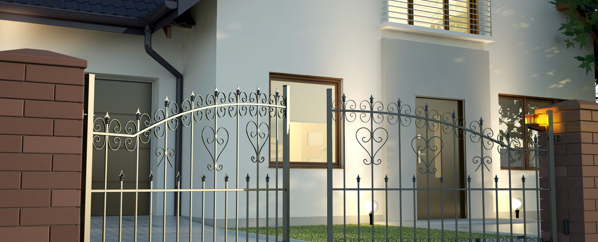 steel fence in the front of a home