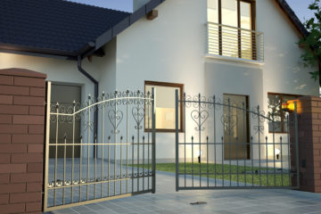steel fence in the front of a home